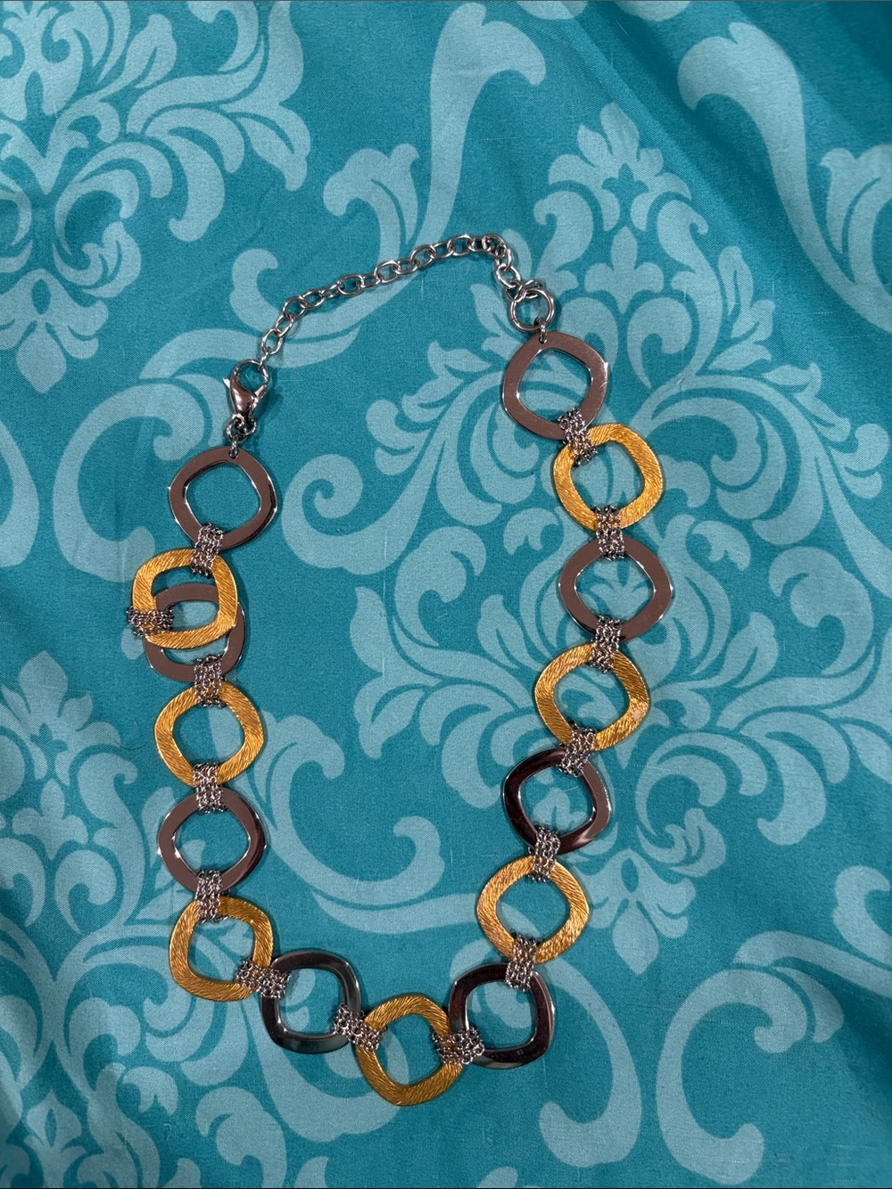 Steel by design steel and gold plated 17 in ring necklace with 4 in extender.